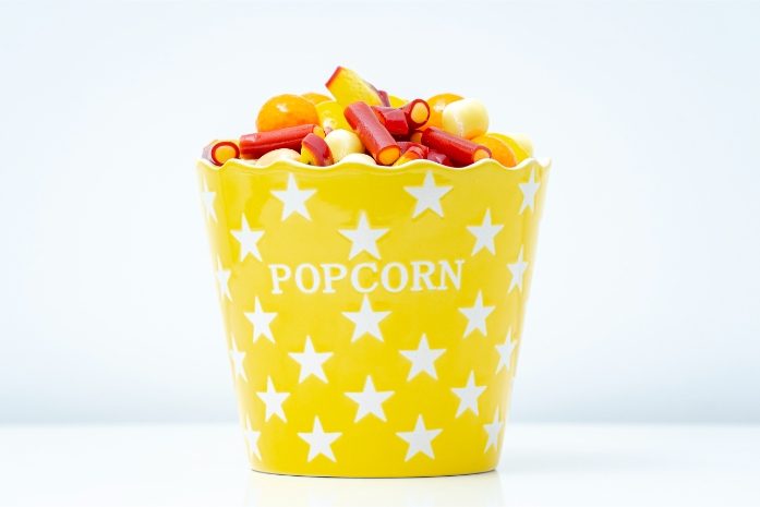 POP CORN AMARILLO ESTRELLAS RELLENO DE CHUCHES VARIADAS